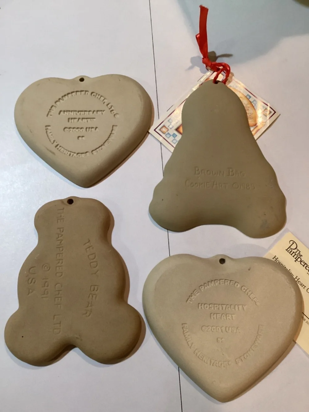 Set of 4 ceramic cookie molds, 3 Pampered Chef, 1 Brown Bag Cookie Art